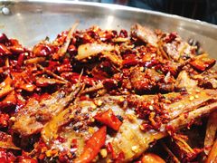 爆辣干锅鸭头-安诚居干锅鸭头(八角店)