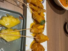黄桃锅包肉-街角等你.大连海鲜烧烤(西安路店)