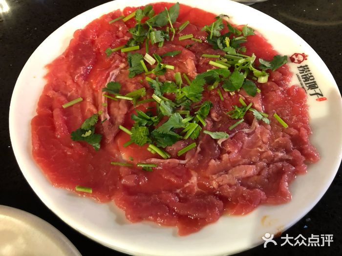 捞锅坝子老火锅(汽博中心店)飘得起的嫩牛肉图片