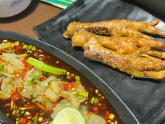 -曼听小寨海鲜烧烤·大连辣炒大王(盖州街店)