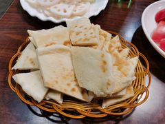 泡饼-超越炭火牛蛙火锅鸡(河东店)