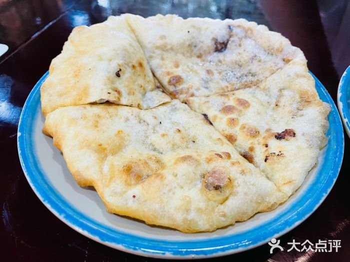 冯四孃跷脚牛肉·非物质文化遗产店红糖饼图片