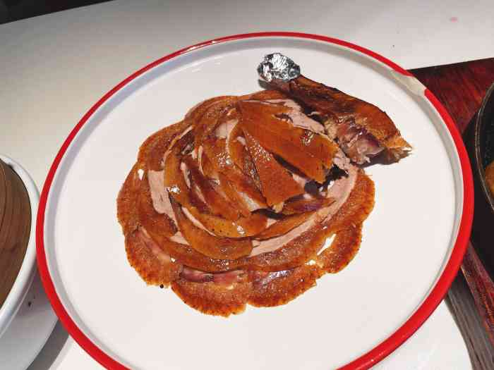 荣记烤鸭(市图书馆店)-"写的是北京知名品牌然而我没查到北京有荣记.