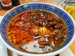 大肠面加素鸡加鸡毛菜加辣肉-沪西老弄堂面馆(定西路店)