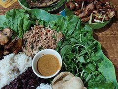 -沐毫傣泐云南菜孔雀宴•手抓饭傣味烧烤(曼听公园店)