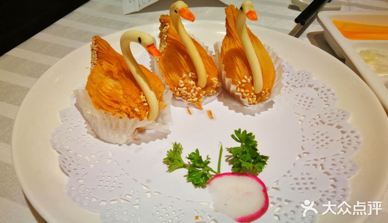 鸭皮烤得很脆，不觉得油腻