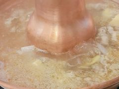 -毛辣果·贵州红酸汤牛肉火锅(西单店)