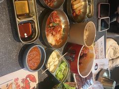 -草家酱蟹炭火烤肉店(珲春南路二店)