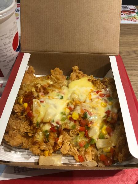 肯德基(东直门内店)-"芝士鸡腿披萨终于和图片相近了环境给差评.