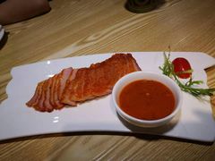 金牌炭烧猪颈肉-渔太泰漓江小馆·广西融合菜(西街店)