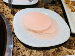 腌萝卜片-猪啊牛呀羊啊铜盘烤肉(正大广场店)