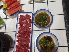 -喜悦小串丹东小黄牛海鲜烧烤大排档(民主广场店)