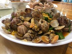 姜葱炒花甲-七鲜渔港美食餐厅(巽寮湾海景店)