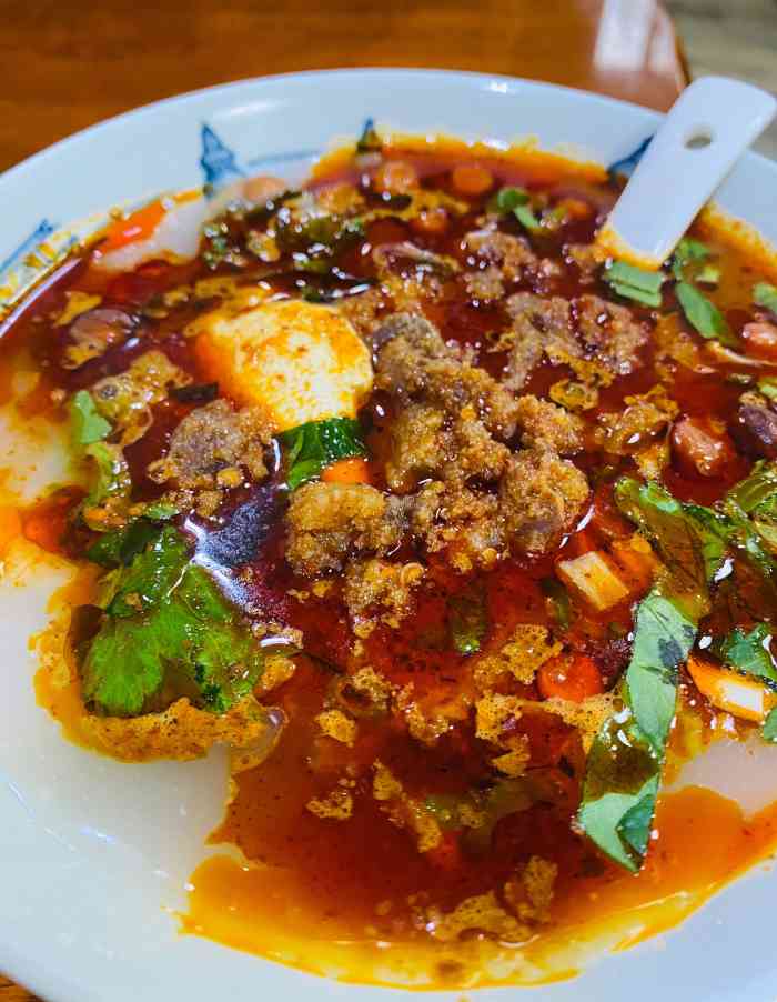 九九豆腐脑(乐山总店)-"吃豆腐脑小妙招 1.搅拌:从下往上,彻底.