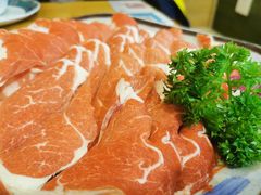 -毛辣果·贵州红酸汤牛肉火锅(西单店)