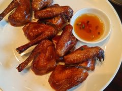 脆皮烤乳鸽-新天世纪中餐厅