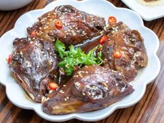 -梁老三麻辣鸡头总店