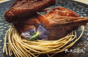 Signature Citrus-Infused Squab (Sliced Four Ways)