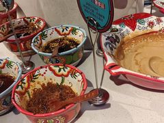 -老牌坊云南鱼豆花火锅(哈西万达店)