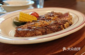 Charcoal Grilled Grain-Fed Ribeye Steak with Spanish Garlic Flavor