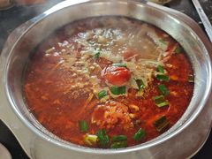 -黄利砖万峰林布依特色酸笋牛肉馆