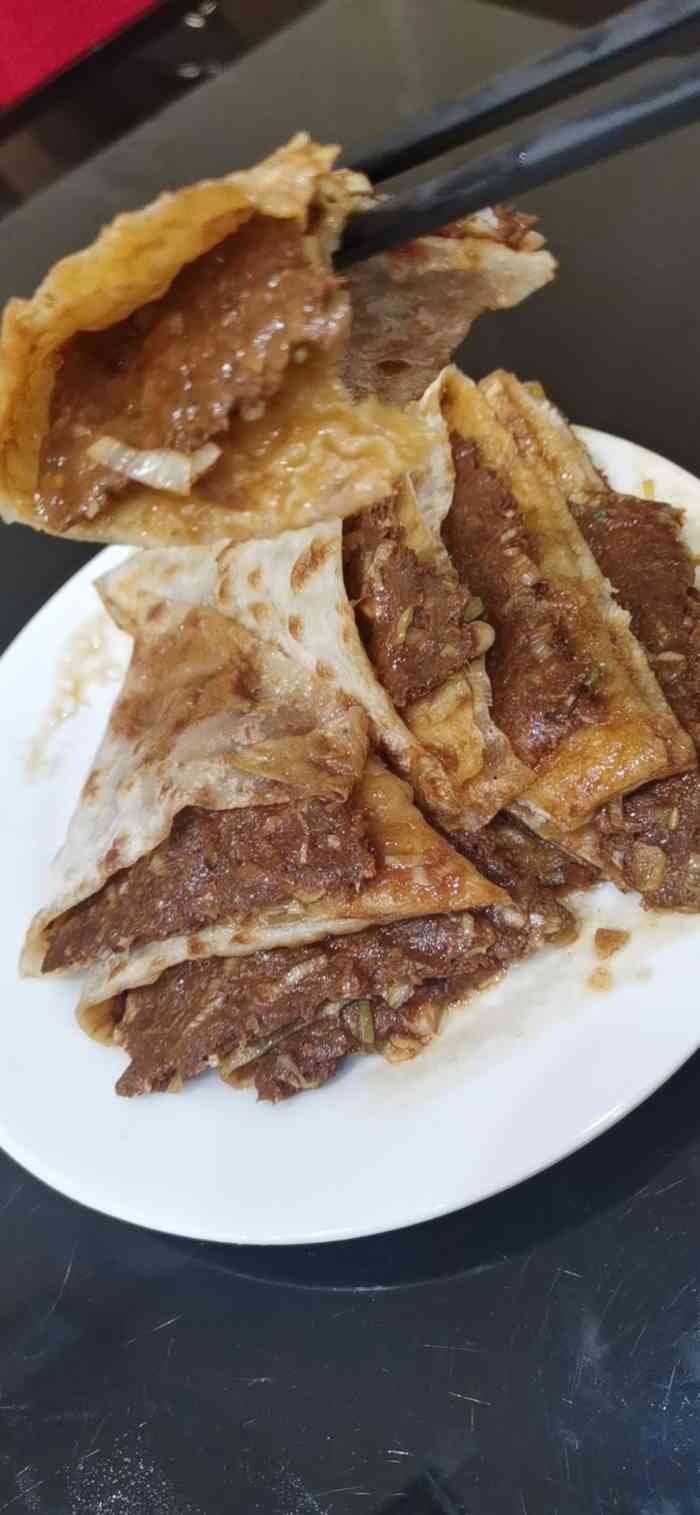 宛平李记小吃(东关街店)-"冒雨来买第二天去延庆的吃食,羊肉片,牛肉.