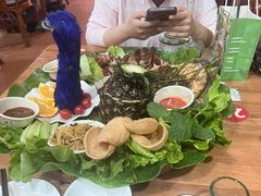 -沐毫傣泐云南菜孔雀宴•手抓饭傣味烧烤(曼听公园店)