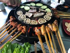 -彝人部落火盆烧烤(原内环足球场店)