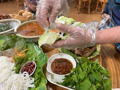 -沐毫傣泐云南菜孔雀宴•手抓饭傣味烧烤(曼听公园店)