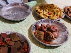 -梁老三麻辣鸡头总店