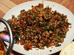 酸腌菜炒肉沫-浩海火燒雲傣家菜(芮欧百货店)