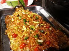 -明何记涮牛肚(品牌首店隋唐植物园南门古城路店)