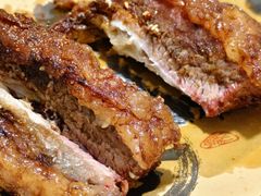 烤牛排-牧民人家羊粪火自煮手把肉餐馆