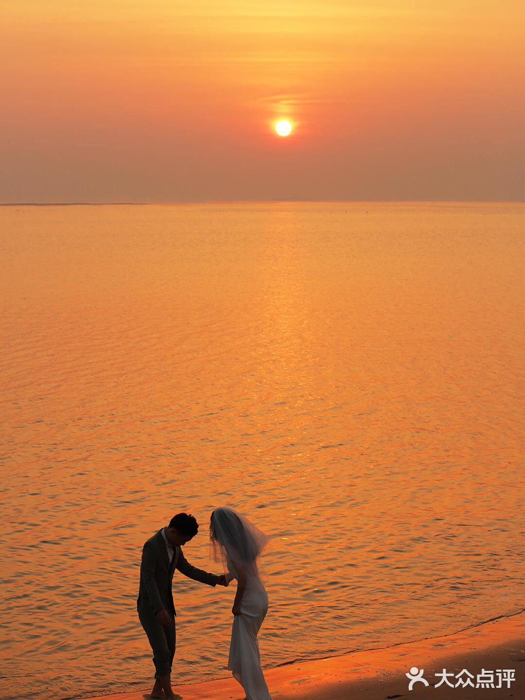 海边夕阳婚纱照