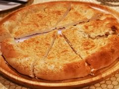 馕坑芝麻馕-巴扎美食·新疆菜·西域歌舞表演餐厅(新疆大厦店)