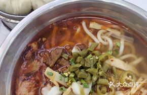 Sour and Spicy Rice Noodles with Fresh Bamboo Shoots and Beef
