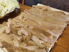 金牌毛肚-明何记涮牛肚(品牌首店隋唐植物园南门古城路店)