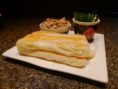 虾酱卷子-渔民船说·北塘海鲜·天津菜·海肠捞饭(北塘古镇店)