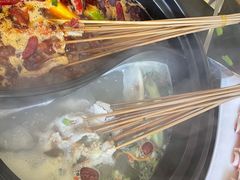 -明何记涮牛肚(品牌首店隋唐植物园南门古城路店)