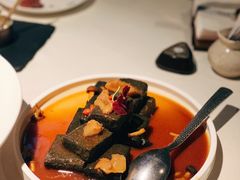 猴头菇鲍汁瑶柱扒制黑豆腐-肴约·花园式餐厅(湖里店)