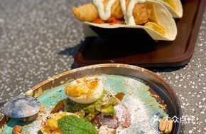Avocado with Soft-Boiled Egg and Mango Caviar