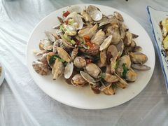 辣炒蛤蜊-1910老鲁味海鲜·戳子肉·青岛菜(金沙滩店)