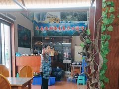 -沐毫傣泐云南菜孔雀宴•手抓饭傣味烧烤(曼听公园店)