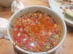 -明何记涮牛肚(品牌首店隋唐植物园南门古城路店)
