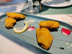 蜜桃经典蛋黄鸡翅-蜜桃花开·中西融合菜E&W(南长街店)