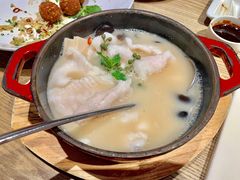 酸汤煮嫩滑鱼片-小大董·烤鸭(凤凰汇店)