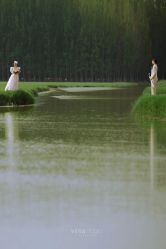 -至臻微拉婚纱摄影