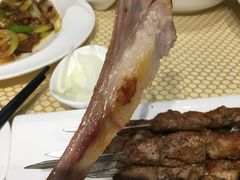 馕坑果木烤羊排-巴扎美食·新疆菜·西域歌舞表演餐厅(新疆大厦店)