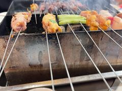 -喜悦小串丹东小黄牛海鲜烧烤大排档(民主广场店)