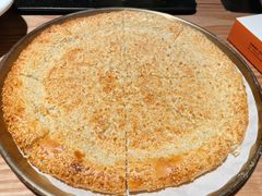 刚出炉的烤馕-谷丽麦馕新疆菜·清真(步步高梅溪新天地店)